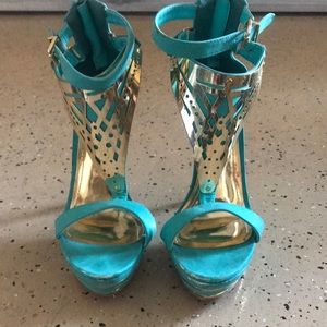 Teal blue with gold open toe heels. Size 7/7 1-2